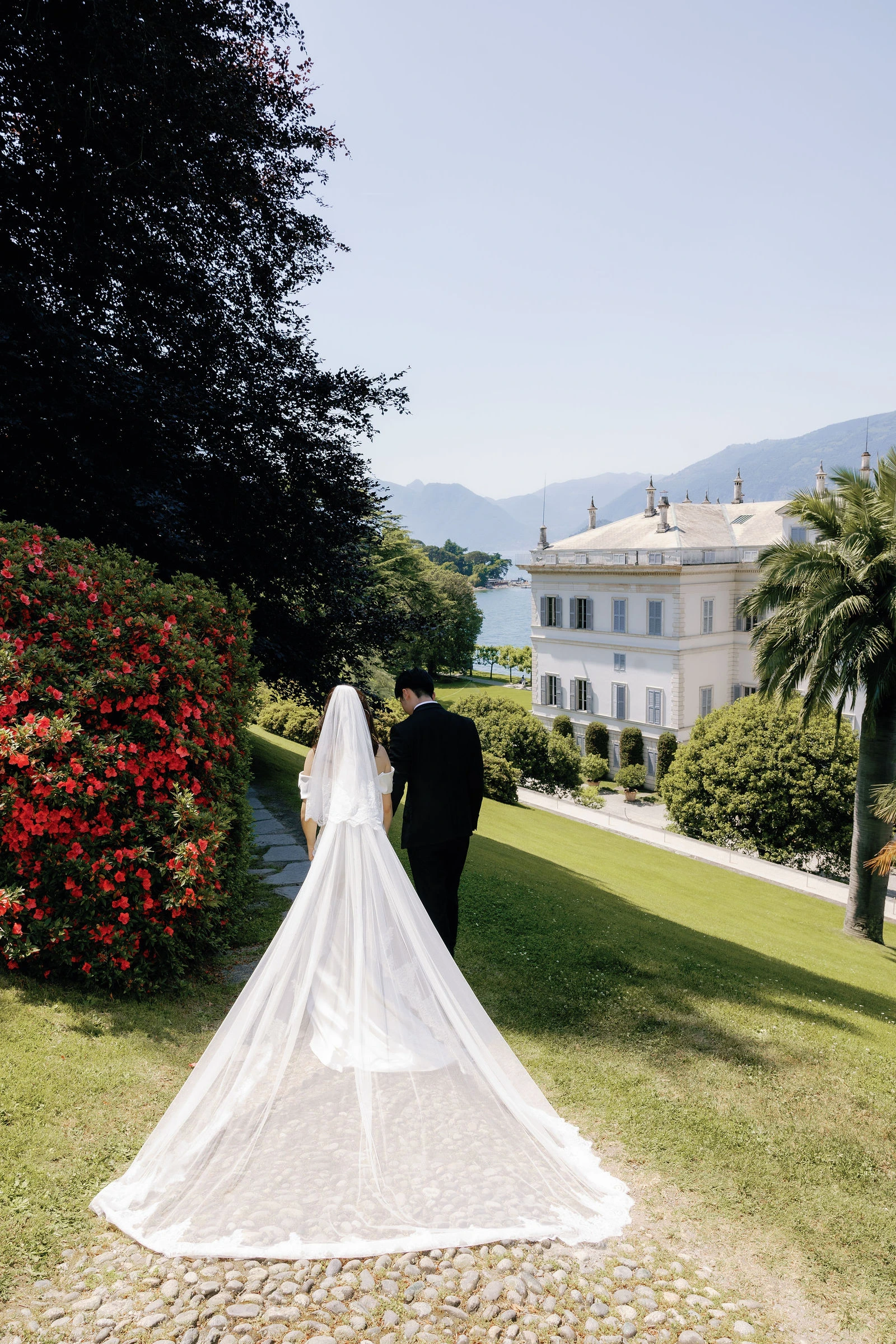 Long veil trailing across the garden of Villa Melzi, Lake Como