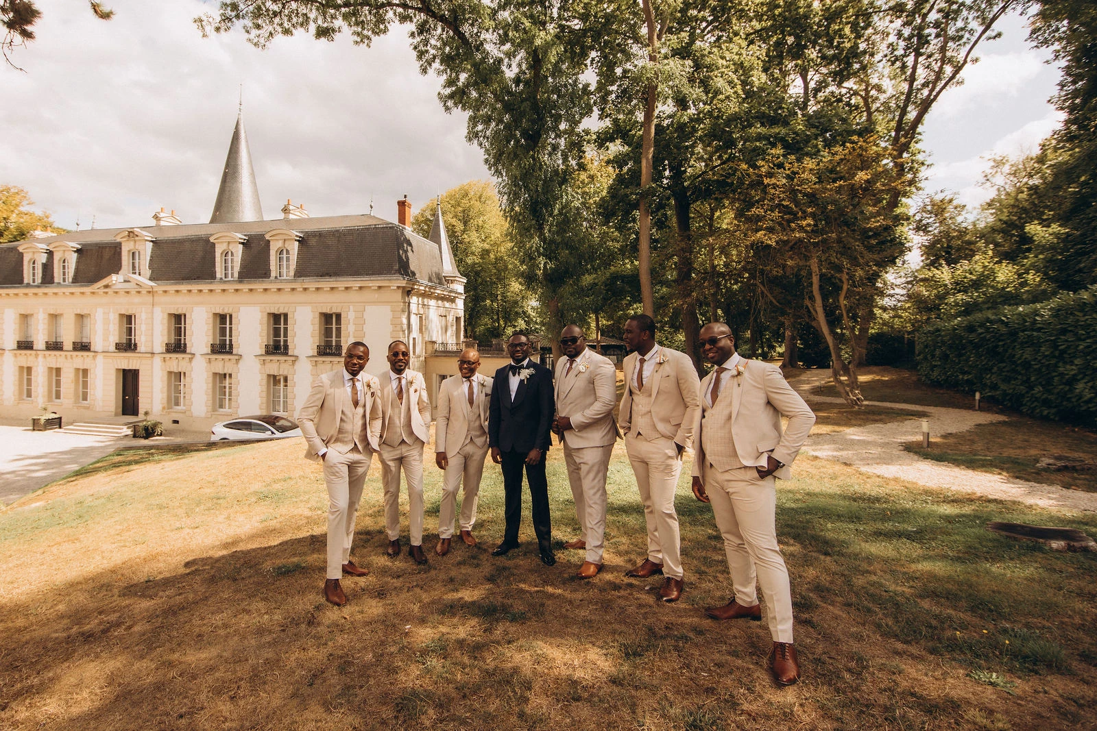 Groom with his groomsmen in front of the château