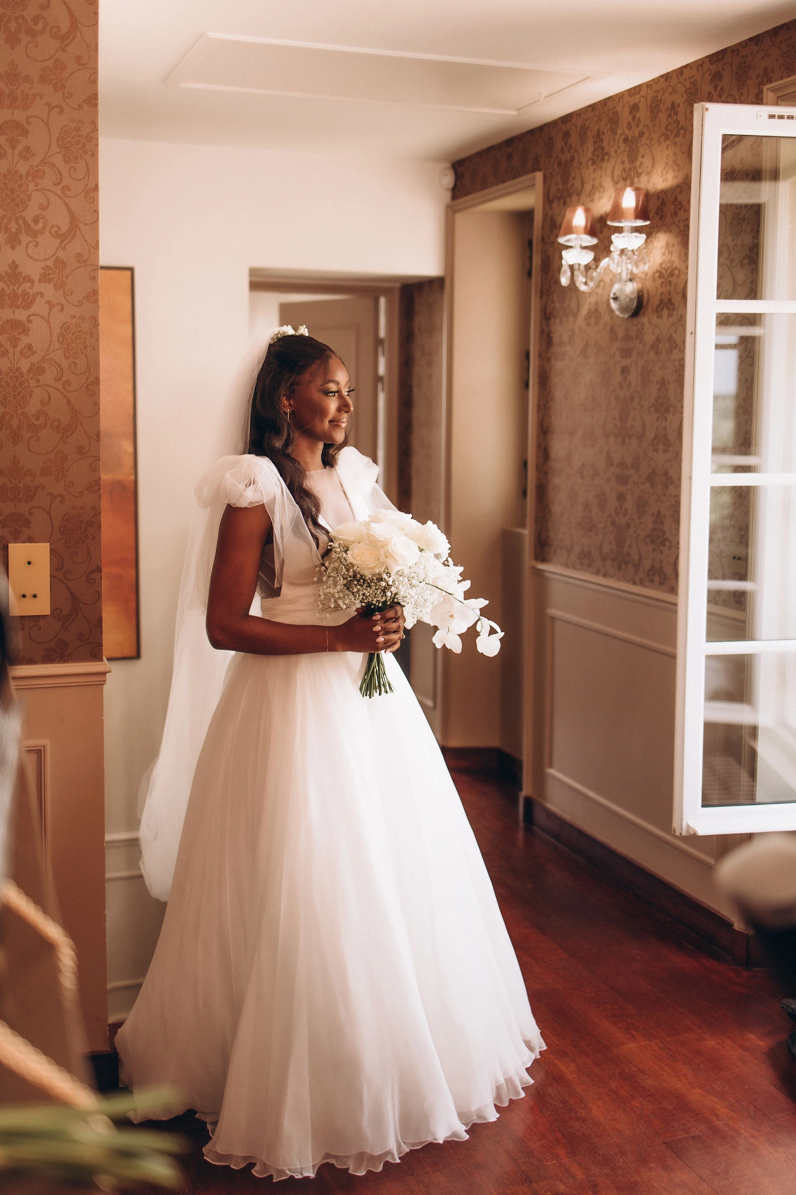 Bride by the window before the first look