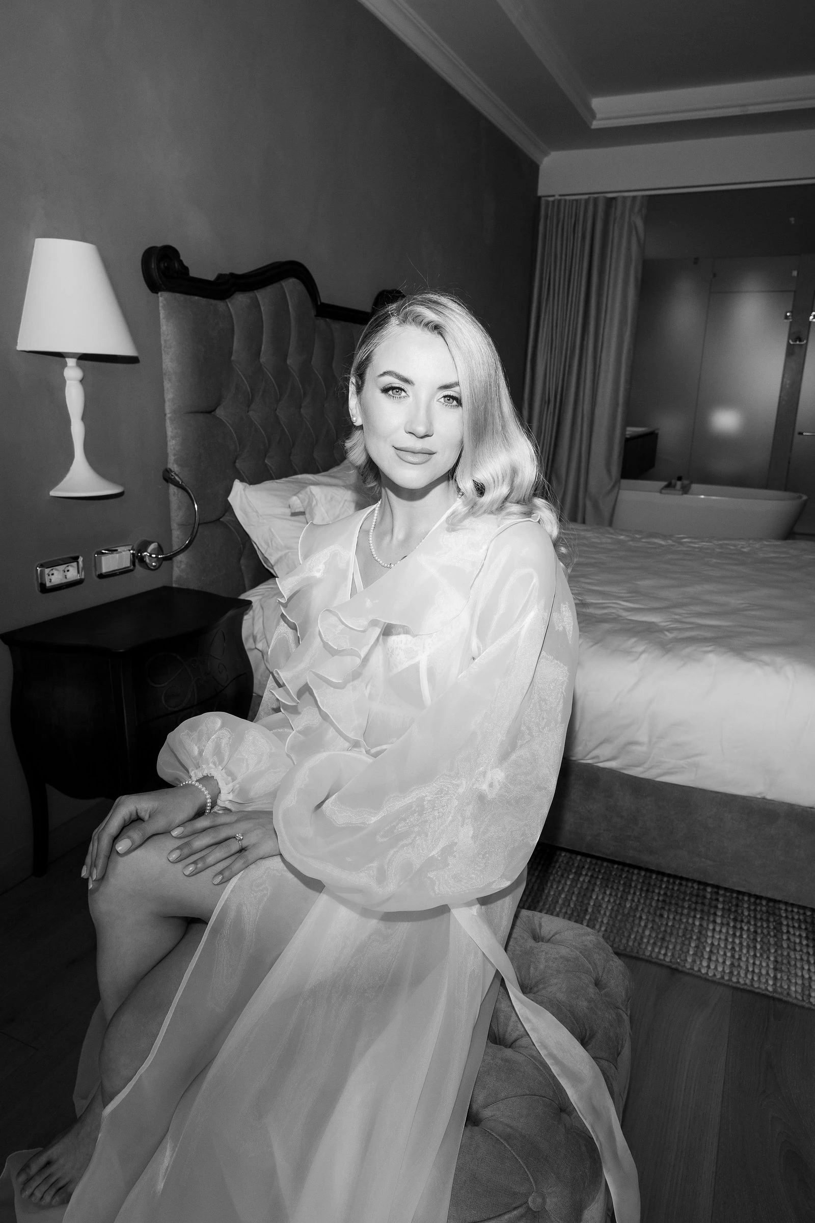 Black and white portrait of the bride getting ready