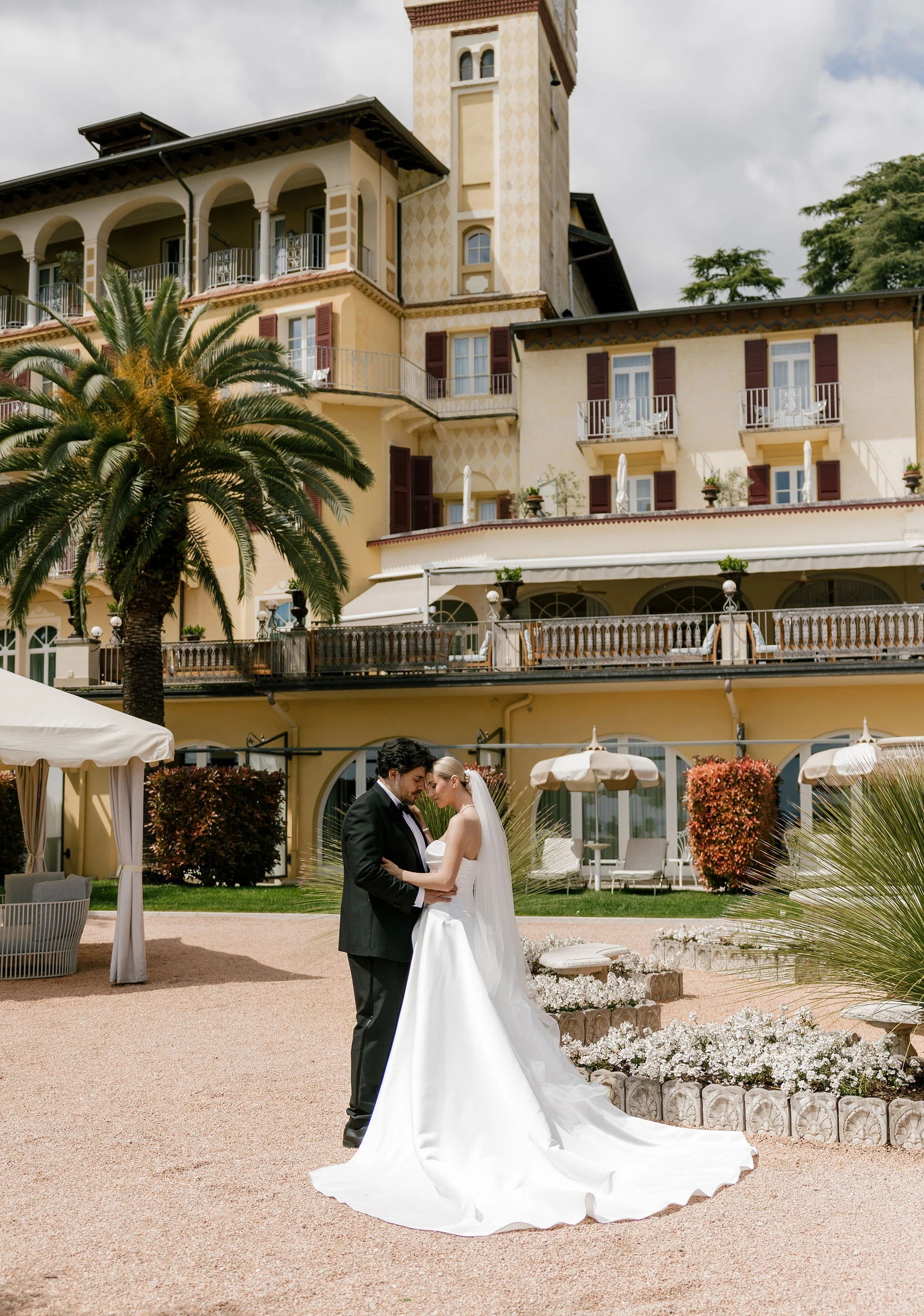 Couple in front of the hotel tower