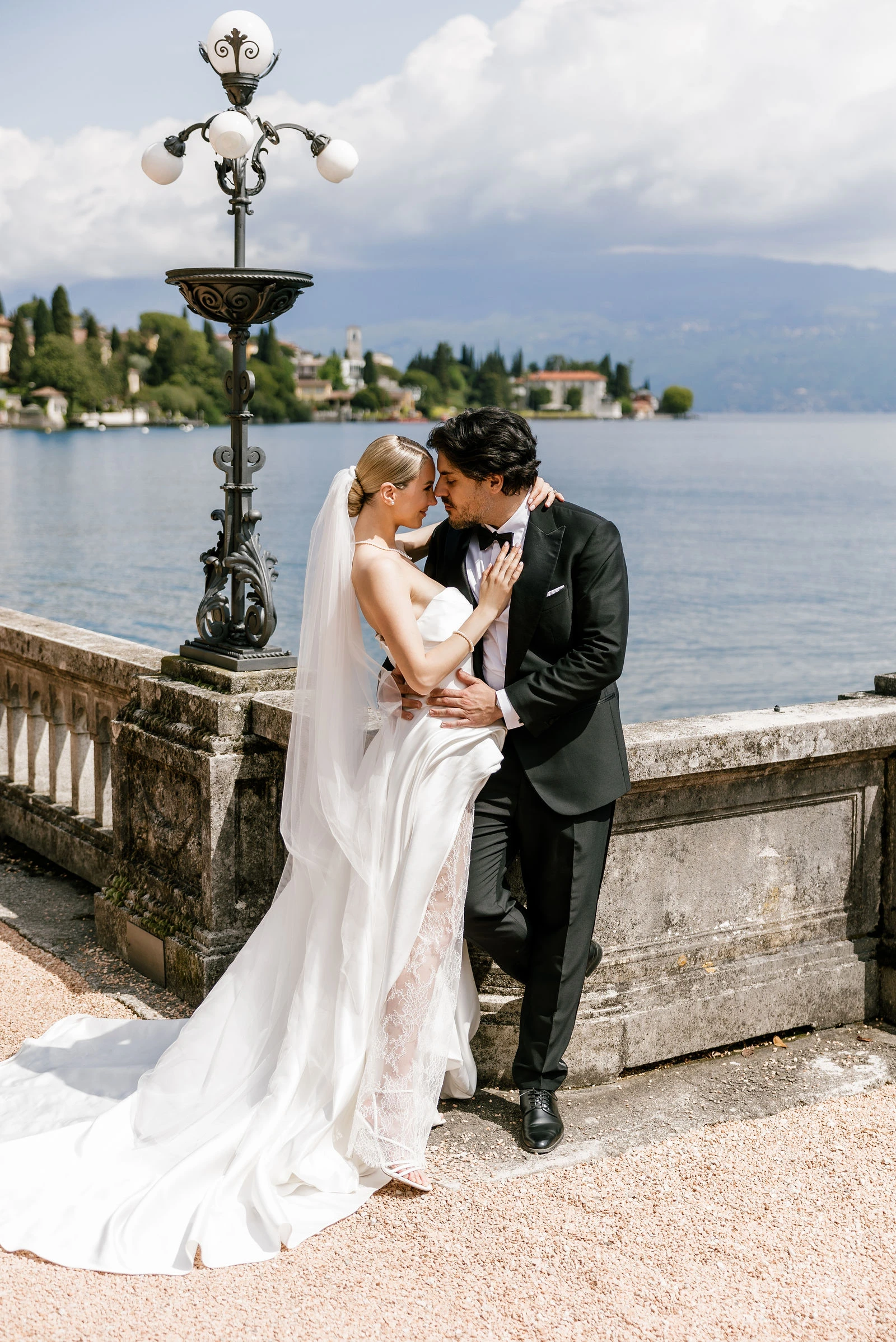 Couple on the lakeside terrace with lanterns
