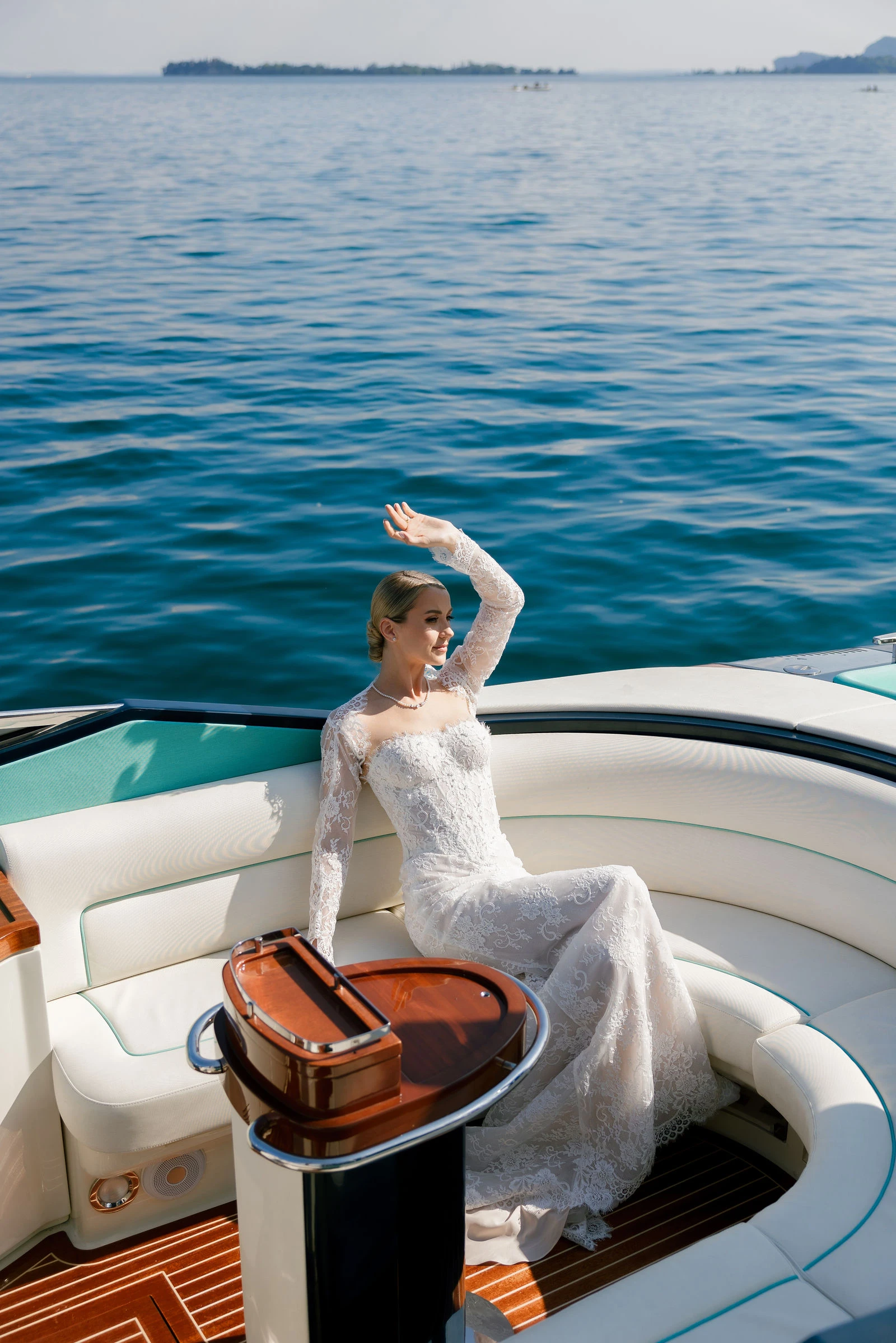 Bride on the Riva on open water