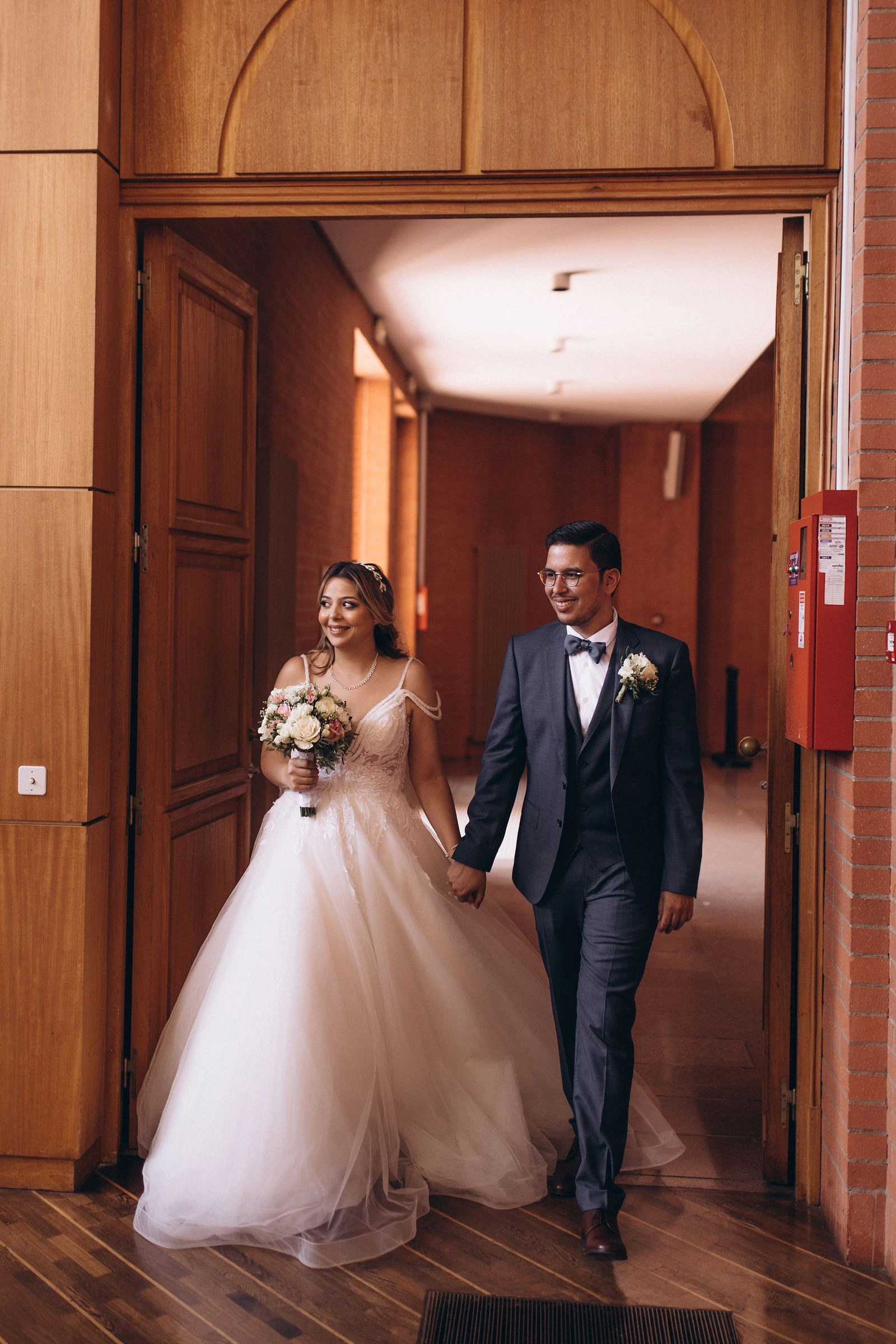 Couple walking into the town hall