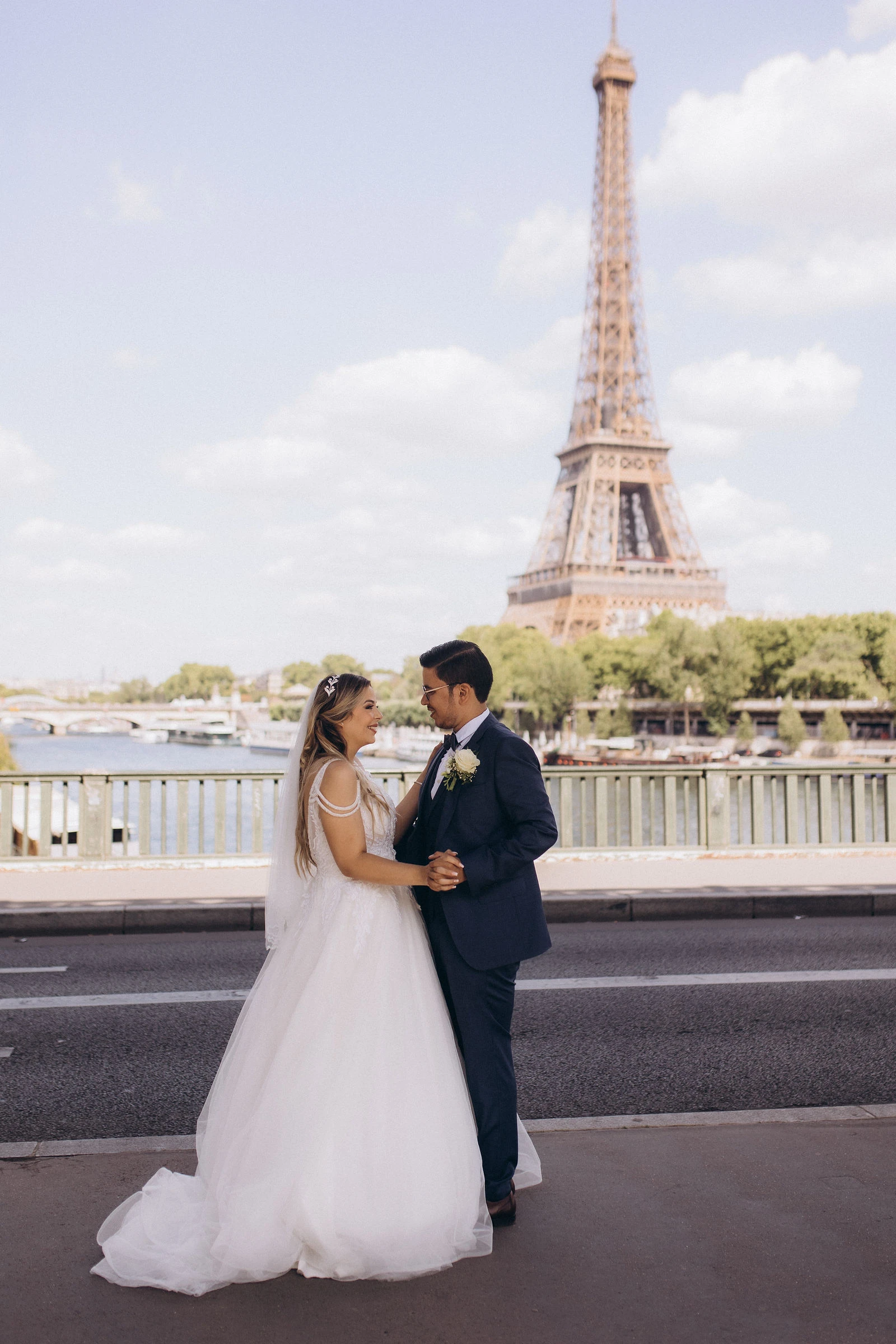 Couple by the Seine with the Eiffel Tower