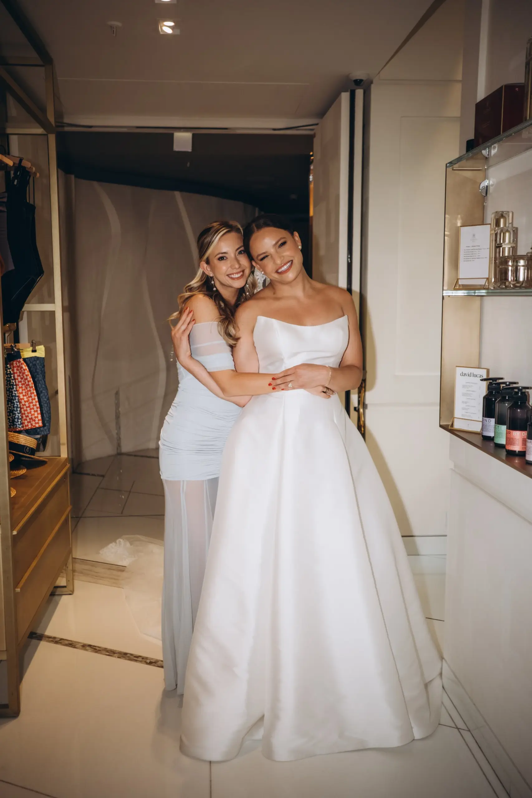Bride with her sister by the window