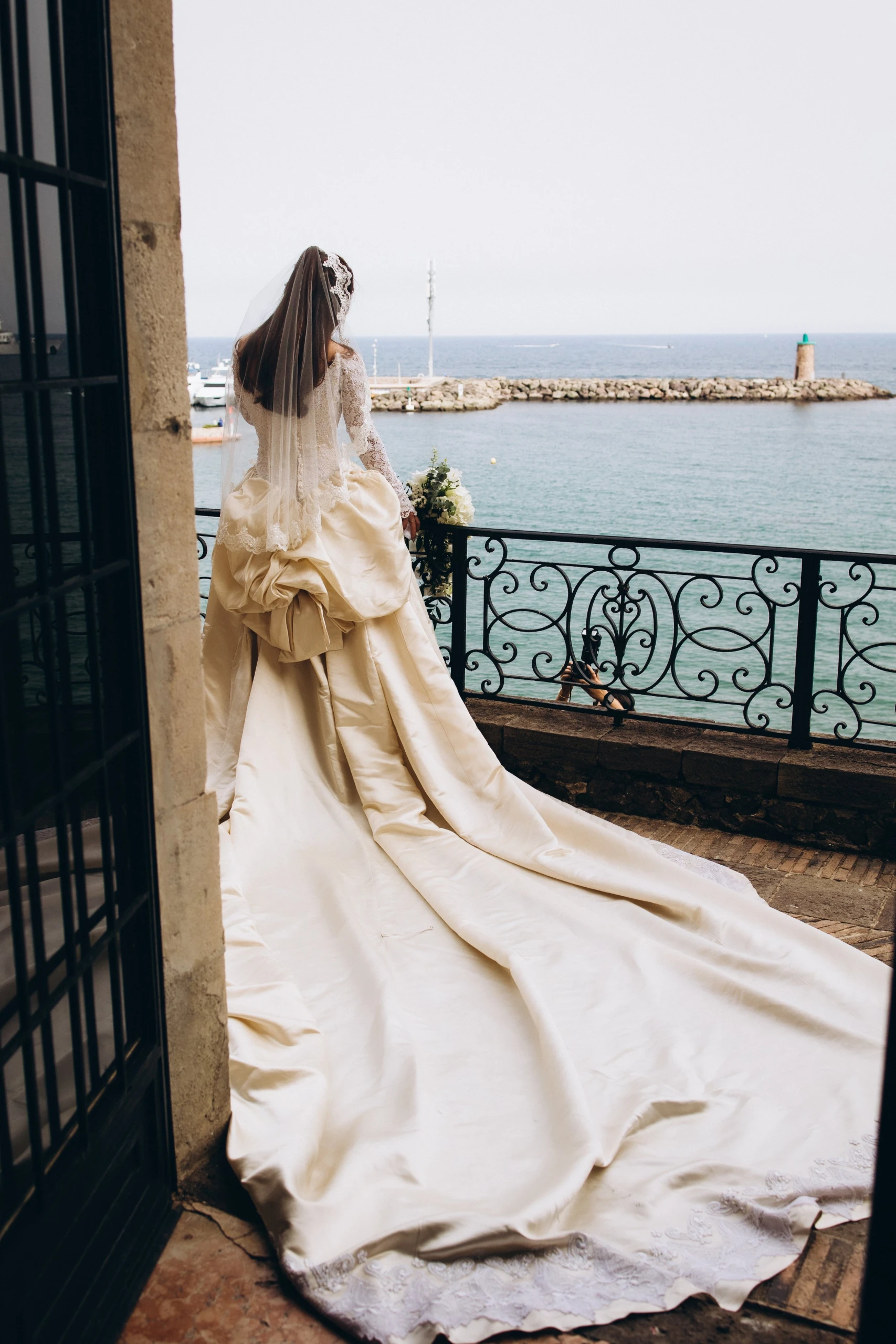 Bride's train on the castle balcony
