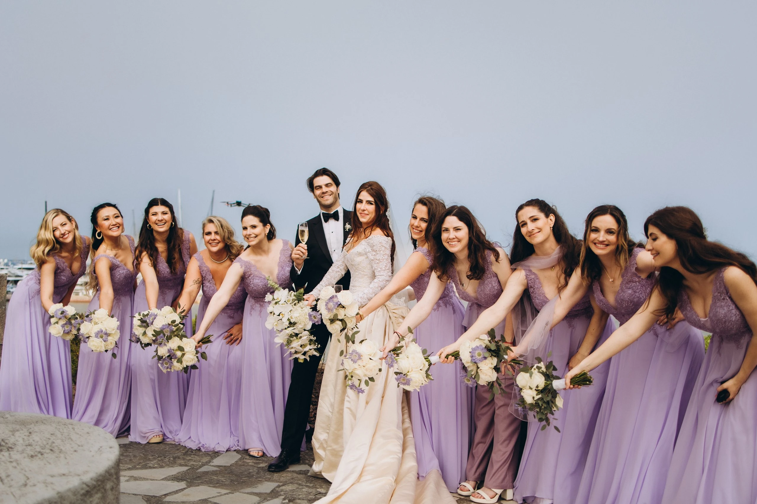 Bridesmaids in lilac by the sea