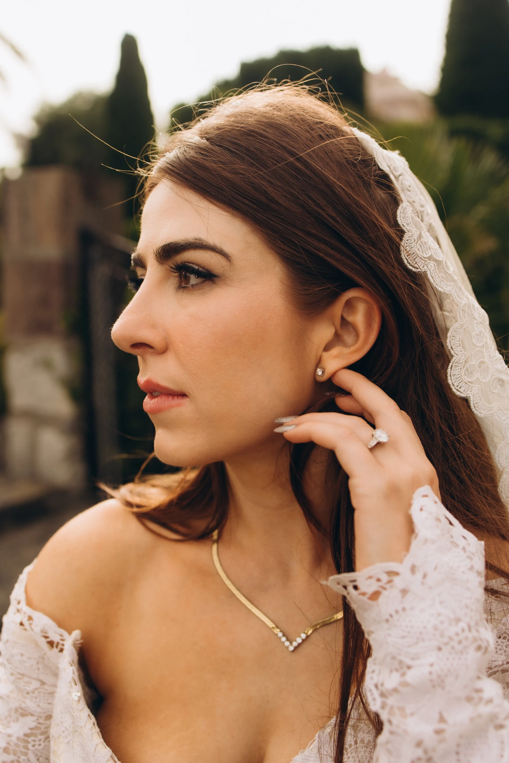 Bridal portrait with pearl earrings